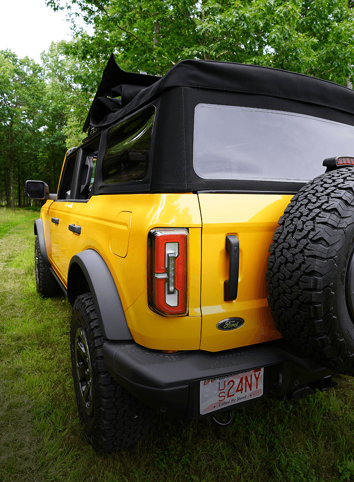Yellow Ford Bronco with Haartz convertible top